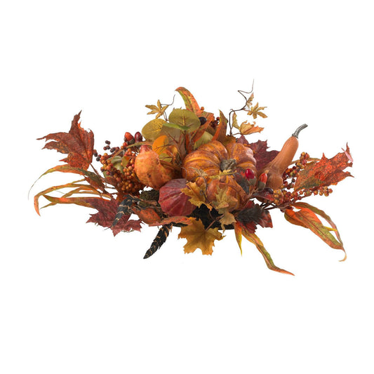 a arrangement of fall leaves and pumpkins