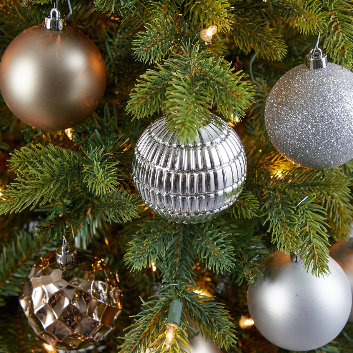 a tree with ornaments and lights