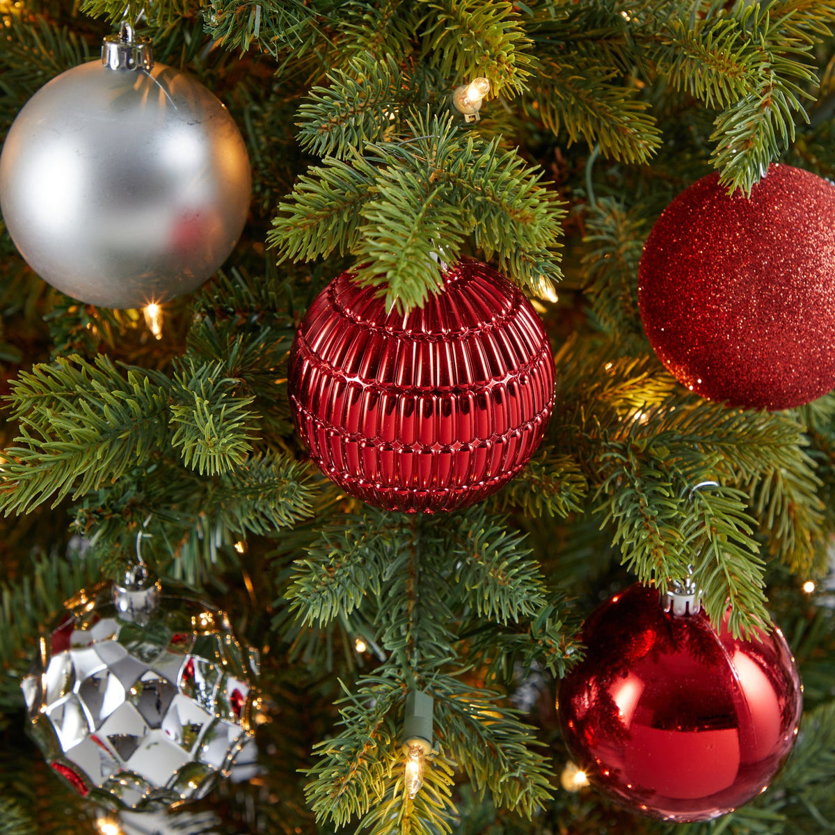 a tree with ornaments and lights