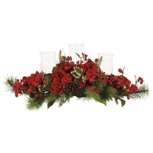 a red flowers and pine cones in a centerpiece