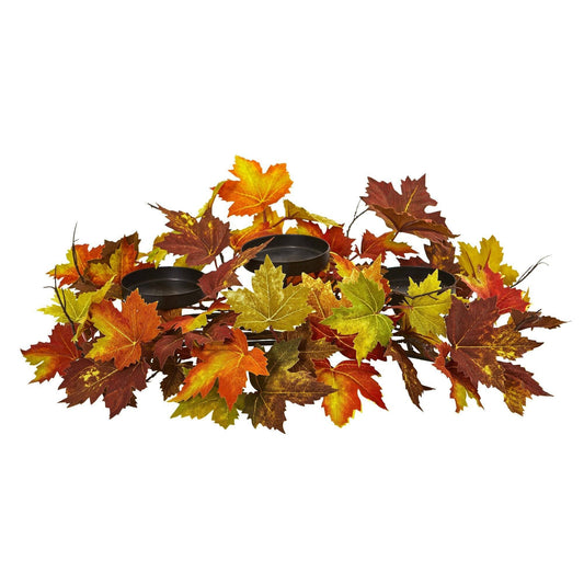 a group of leaves with candles