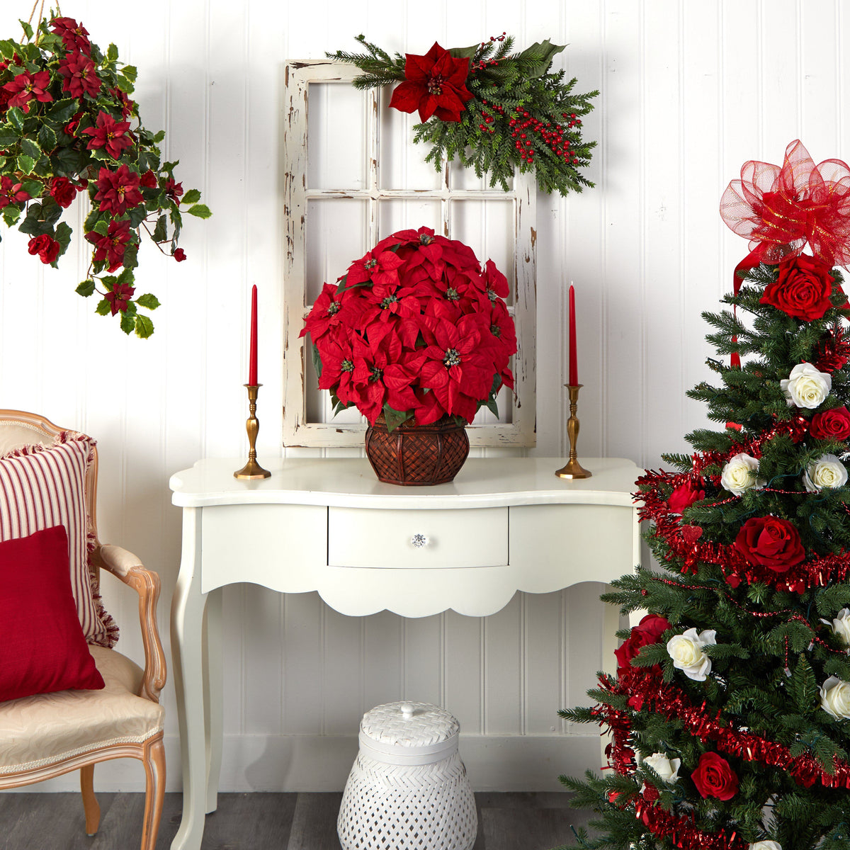 a christmas tree and a table with red flowers
