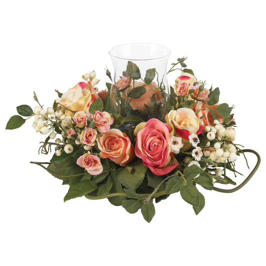 a bouquet of flowers and a candle