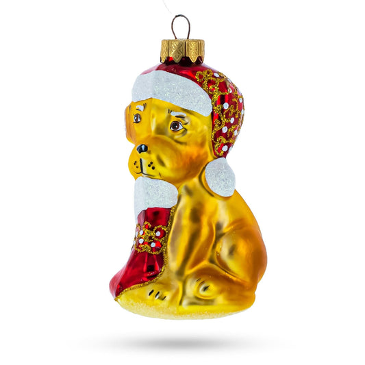 a gold and red dog ornament