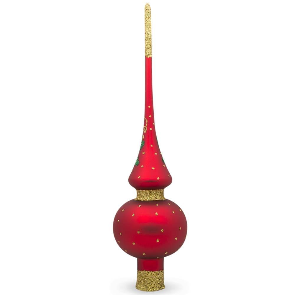 a red and gold christmas tree topper