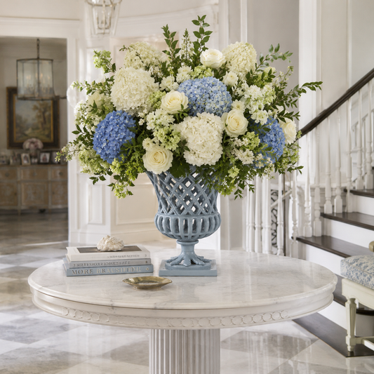 a vase of flowers on a table