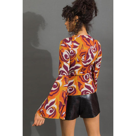 HER FAVORITE FEATURES SWEATER TOP