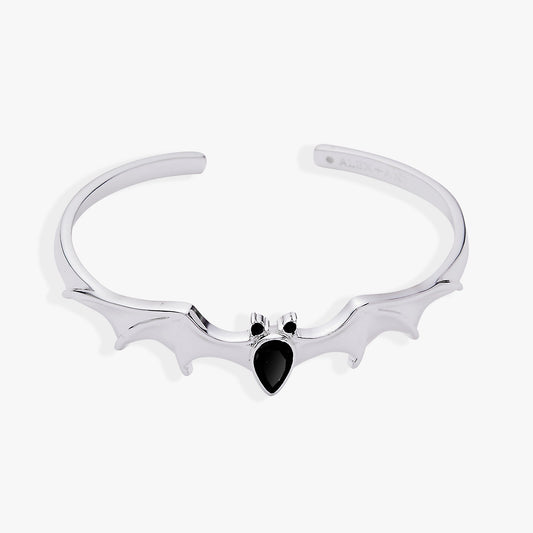 a silver bracelet with black stone