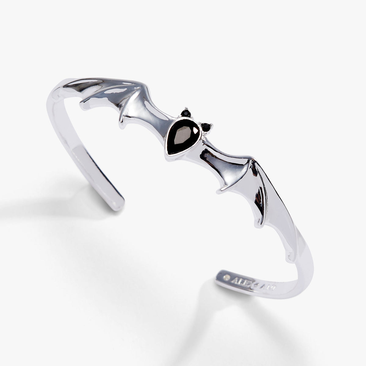 a silver bracelet with a black gem