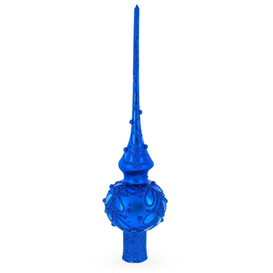 a blue christmas ornament on a white background