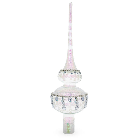 a white and pink christmas tree topper