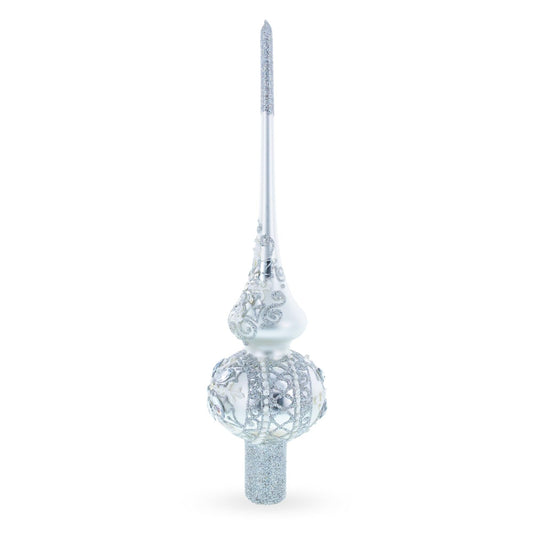 a silver and silver christmas tree topper