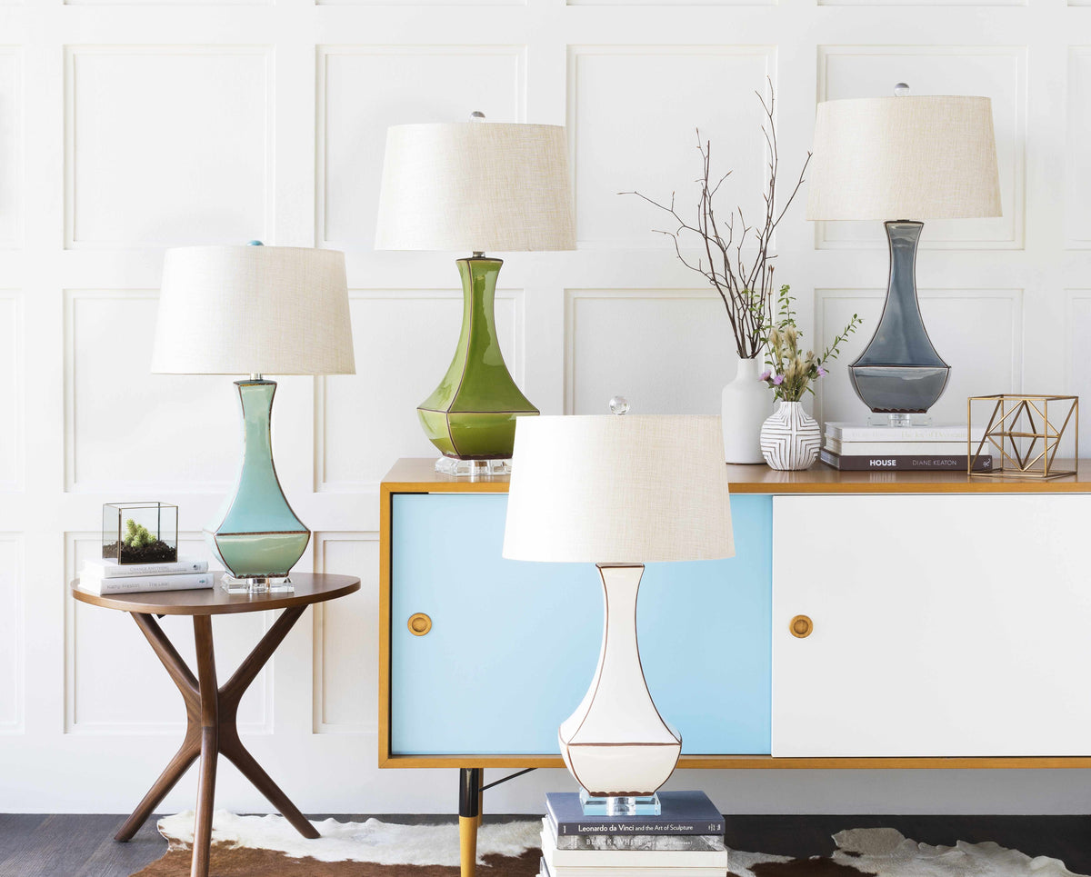 a group of lamps on a table