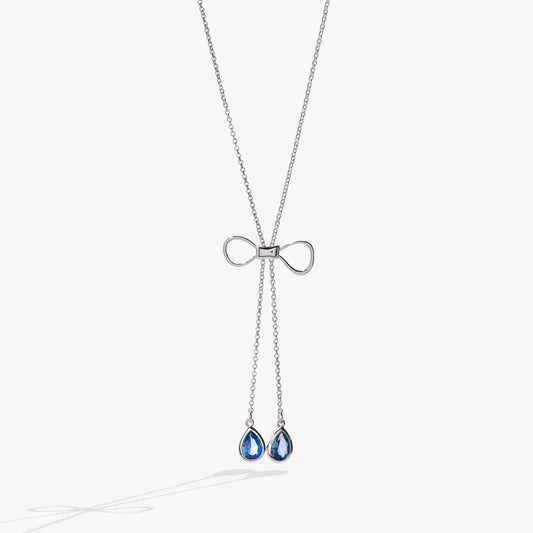 a necklace with blue gems on it