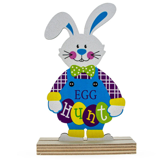 a wooden bunny with a bow tie and letters