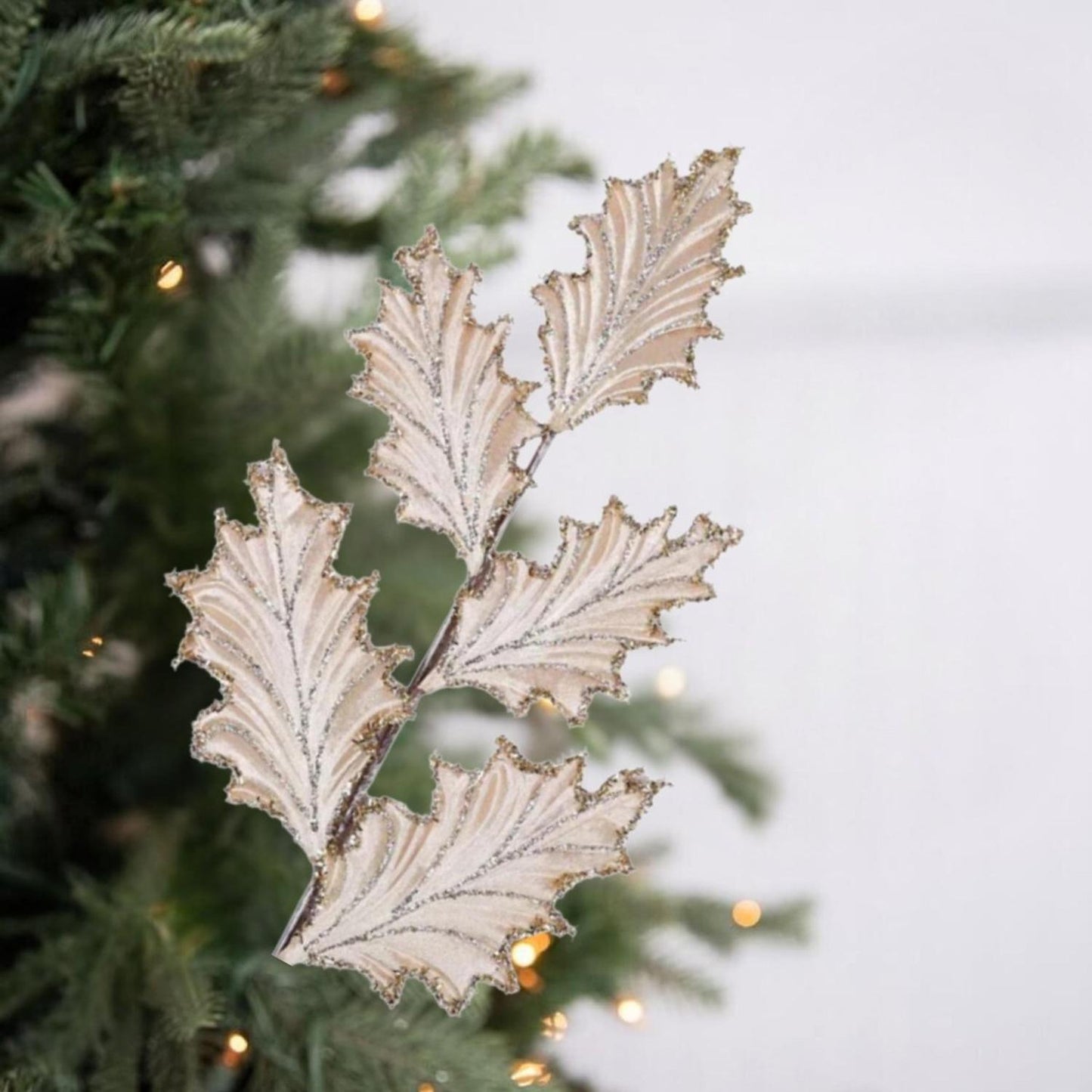 28" Tinsel Holly Leaf Spray: Champagne