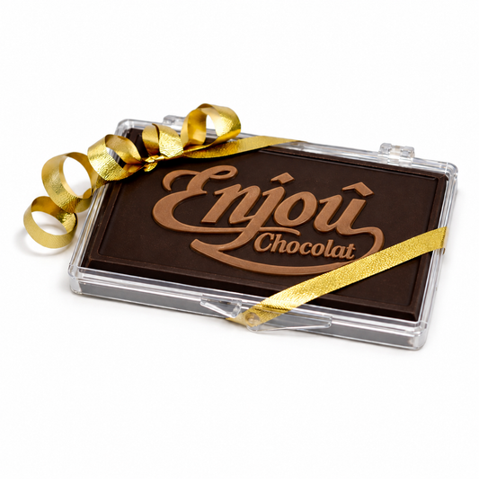 a chocolate bar with a gold ribbon