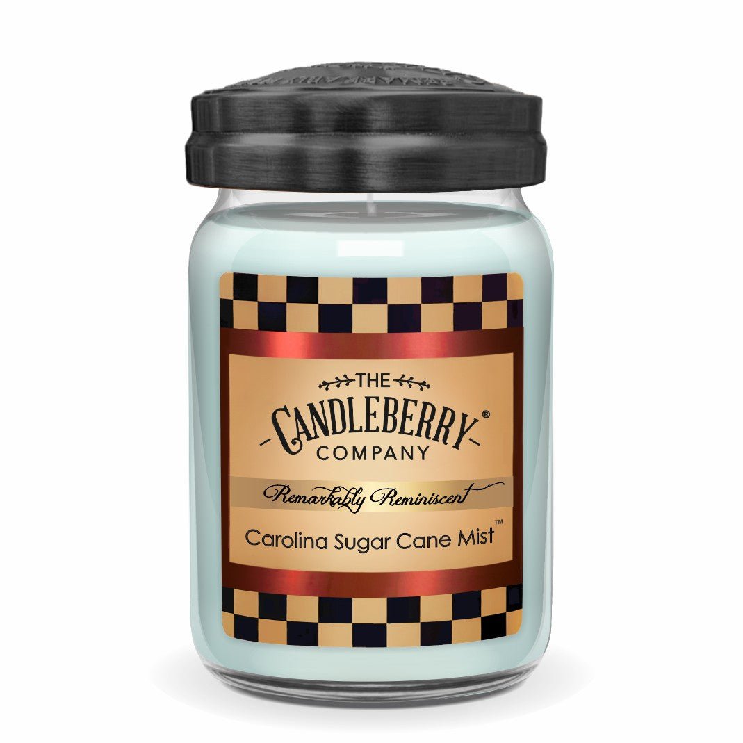 a glass jar with a white candle