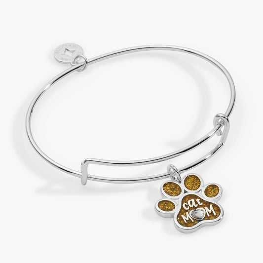 a silver bracelet with a paw print pendant