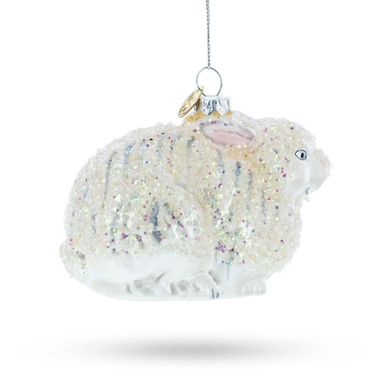 a white sheep ornament on a string