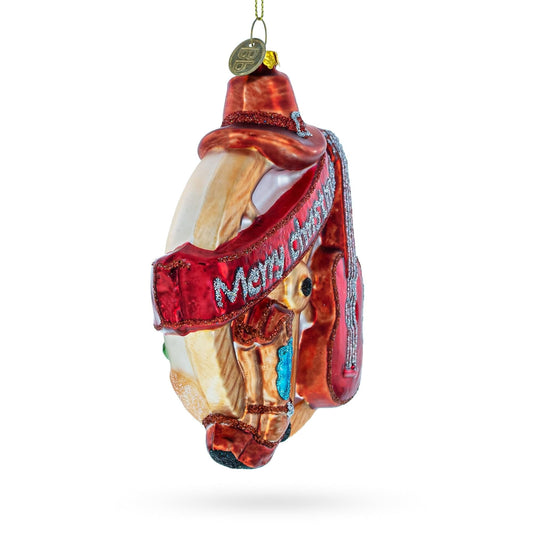 a christmas ornament with a hat and scarf
