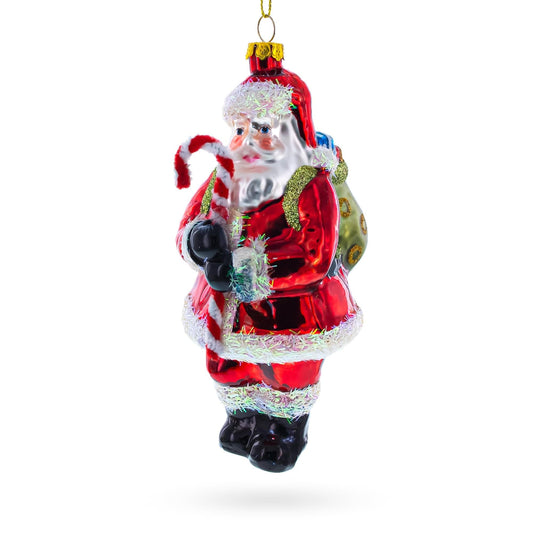 a santa claus ornament on a white background