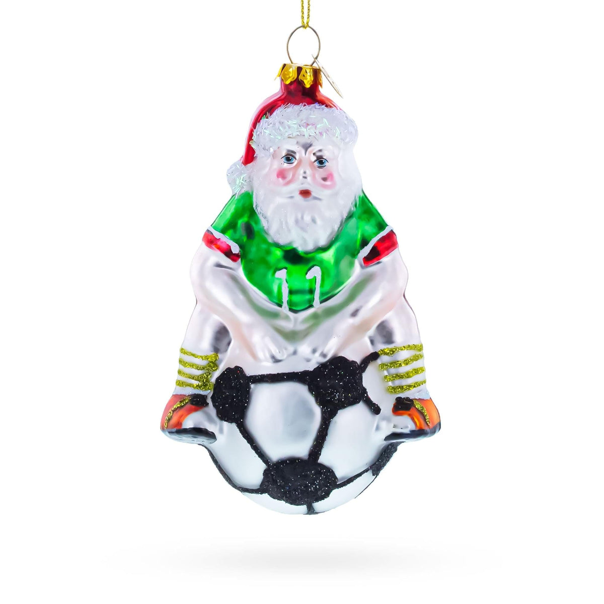 a christmas ornament with santa claus on a steering wheel
