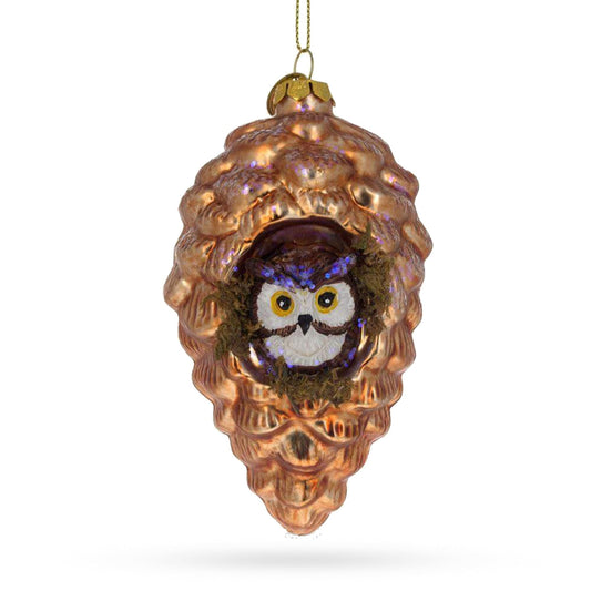 an ornament with an owl inside