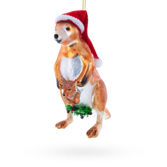 a christmas ornament with a kangaroo wearing a santa hat