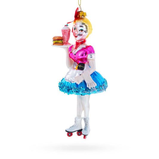 a christmas ornament with a woman holding a tray of food