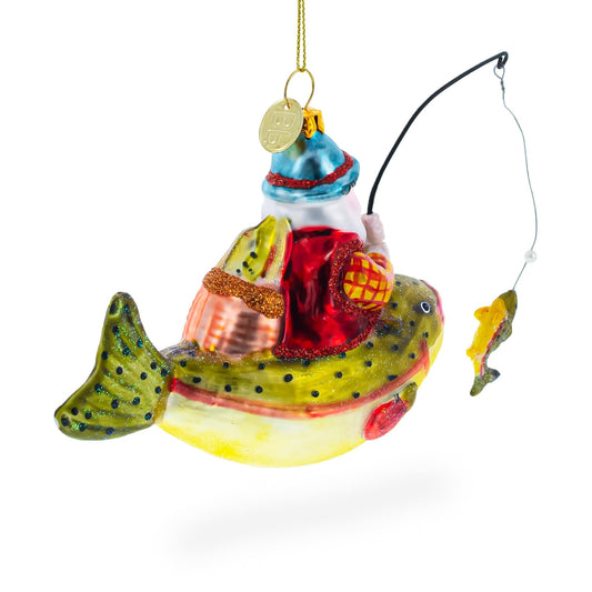 a christmas ornament with a fish and a fishing pole