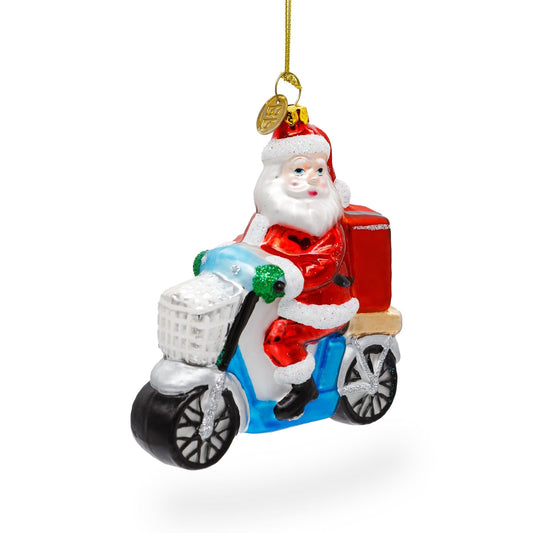 a santa claus on a motorcycle ornament