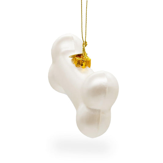 a white bone shaped christmas ornament