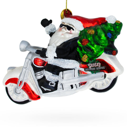 a santa on a motorcycle ornament