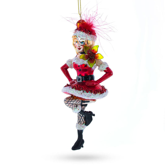 a christmas ornament with a woman in red dress