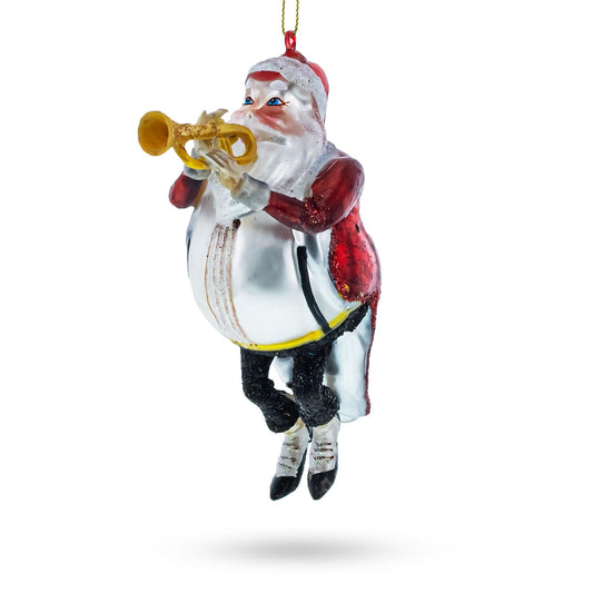 a santa claus ornament with a trumpet
