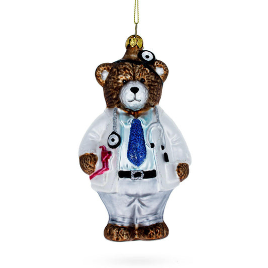 a christmas ornament of a bear wearing a doctor garment
