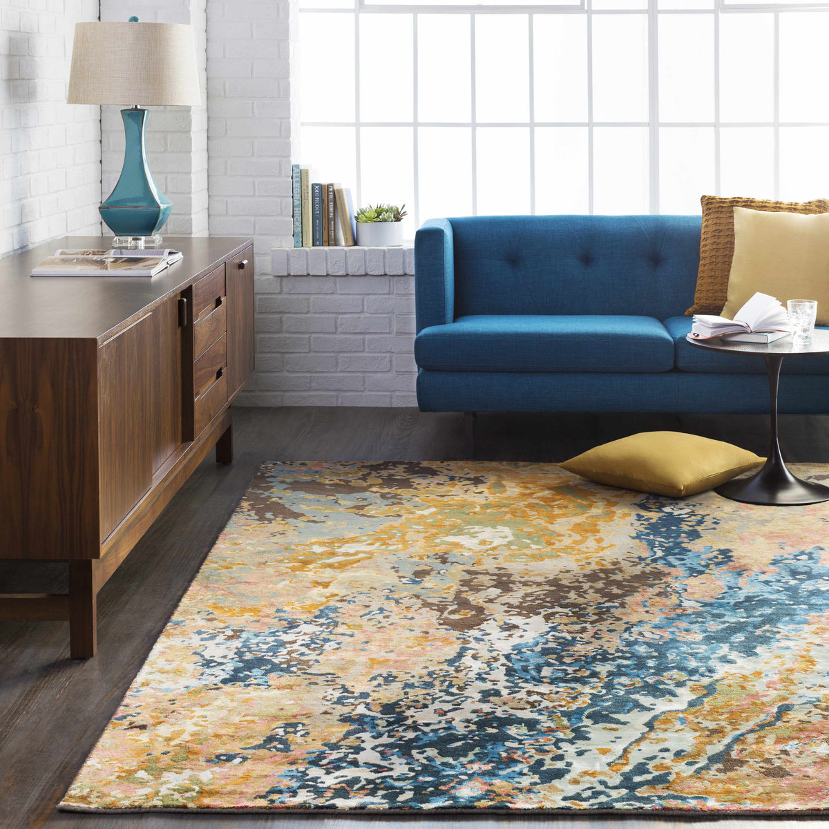 a room with a blue couch and a blue couch