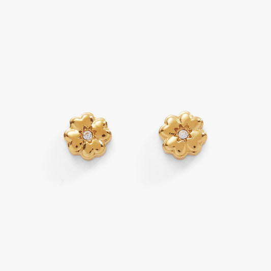 a pair of gold earrings with diamonds