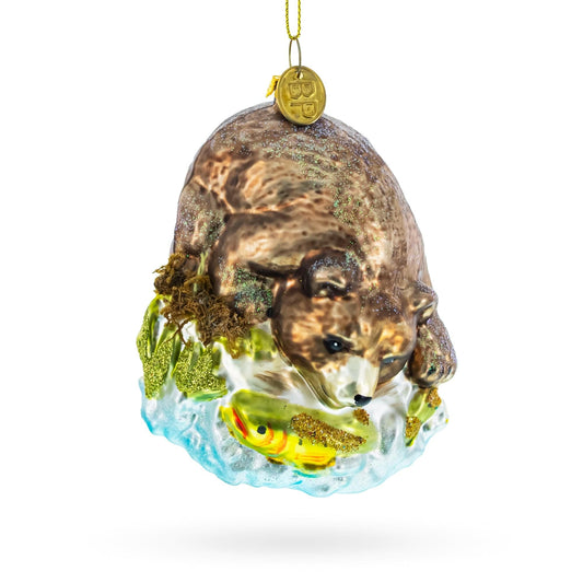 a christmas ornament with a bear and fish