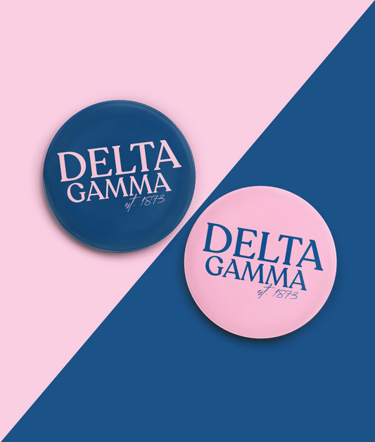 two blue and pink badges