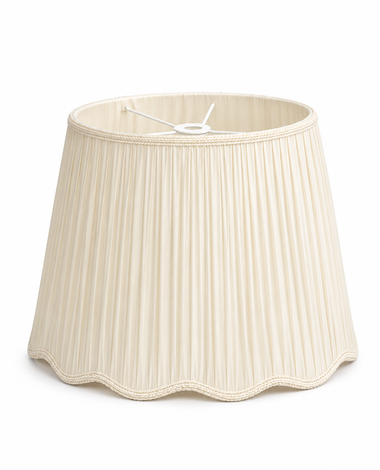 a white lamp shade with a white shade