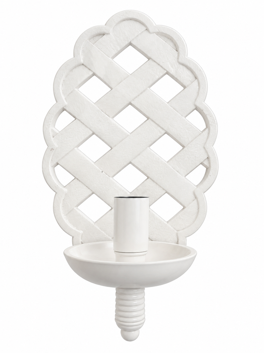 a white object with a cup on it