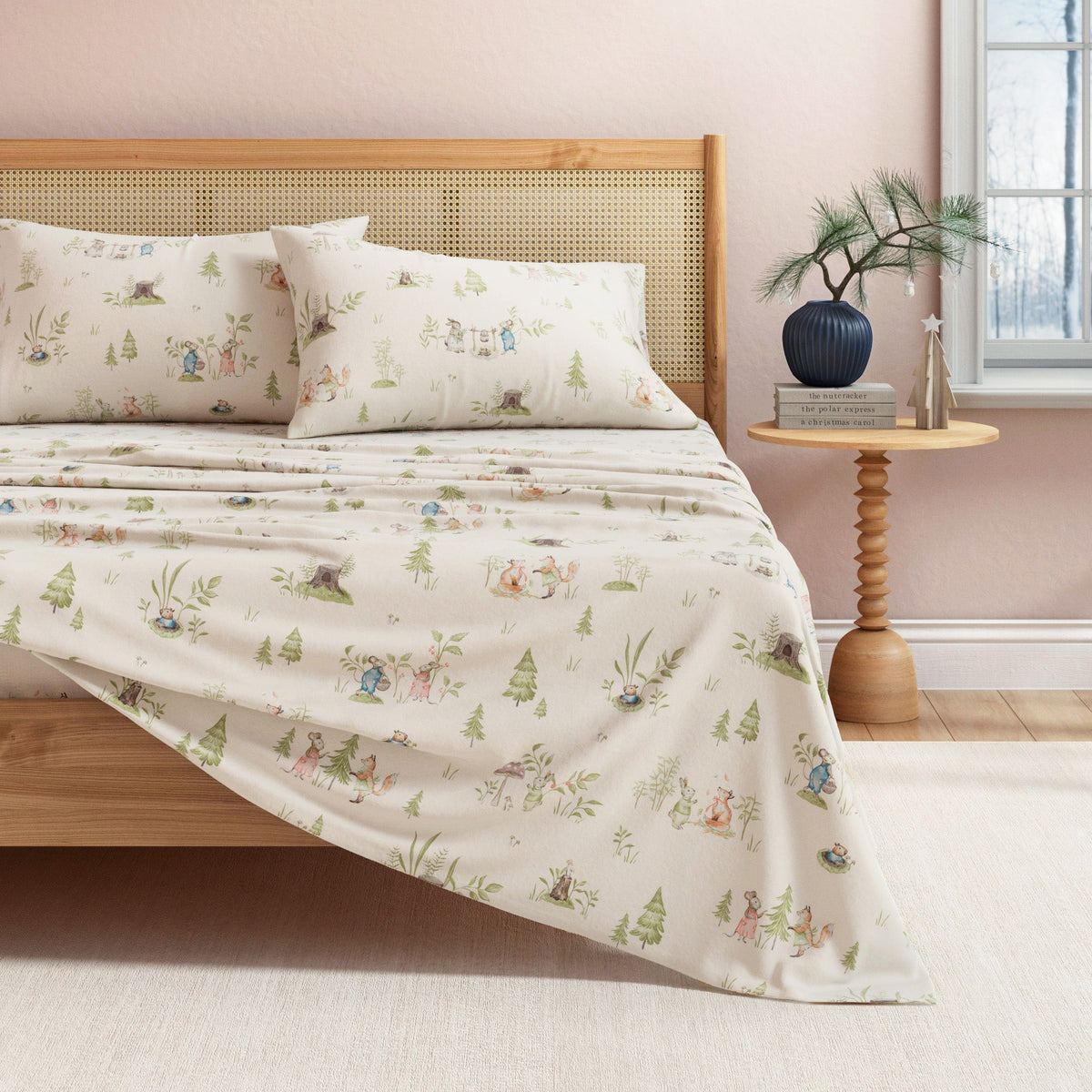 a bed with a blanket and pillows