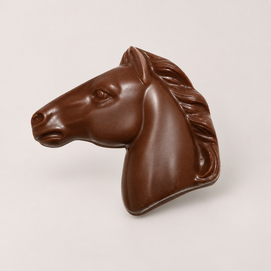 a chocolate horse head on a white background