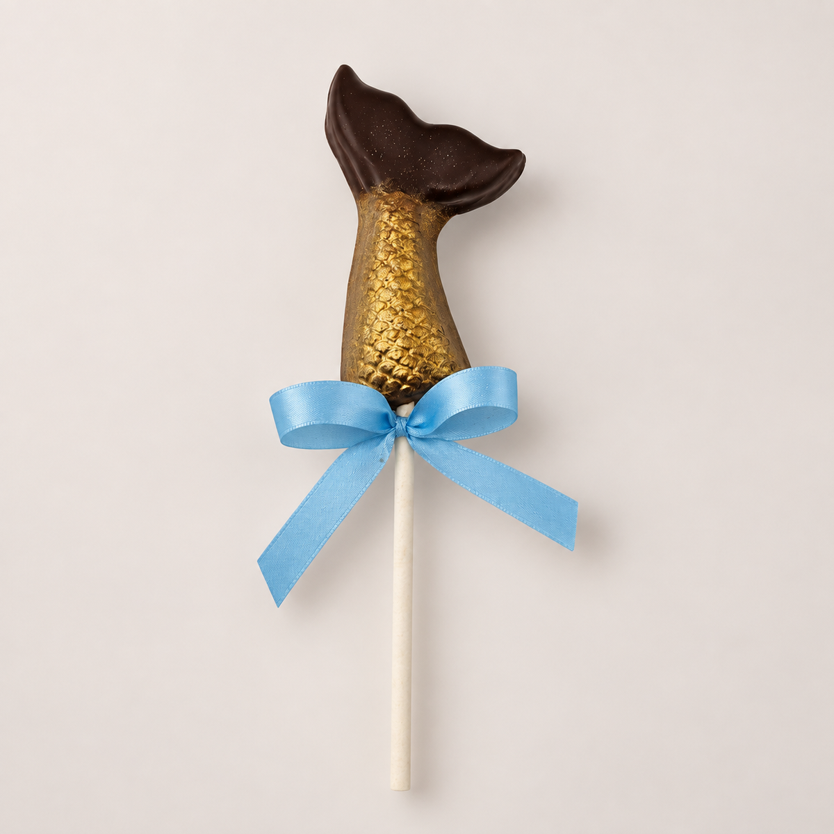 a chocolate mermaid tail lollipop