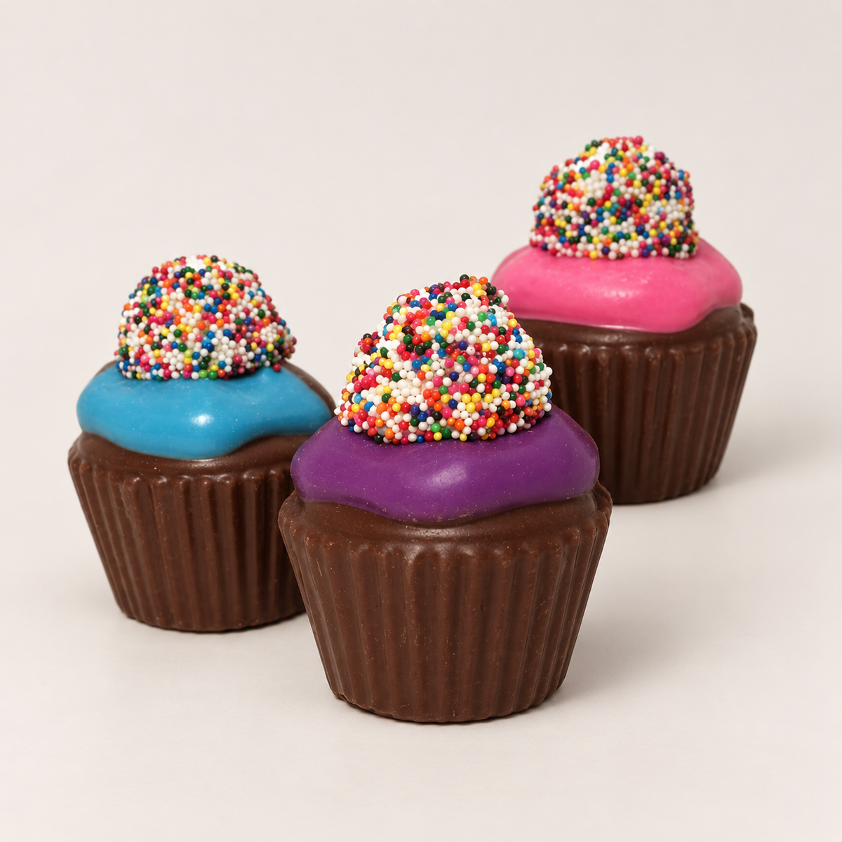 a group of cupcakes with sprinkles