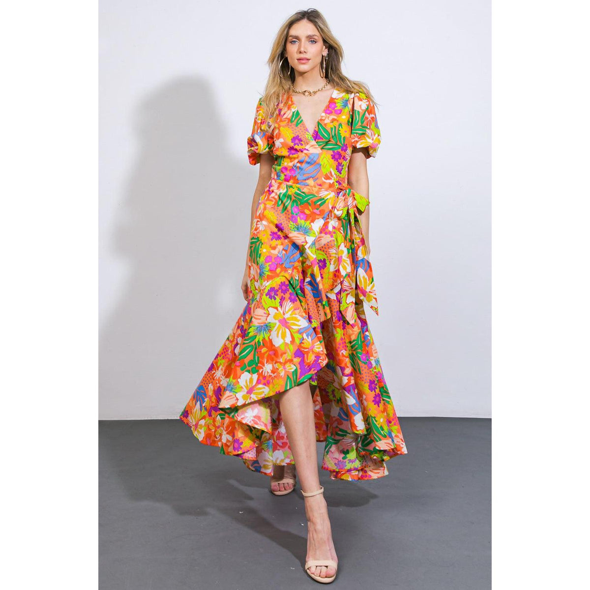 a woman in a colorful dress