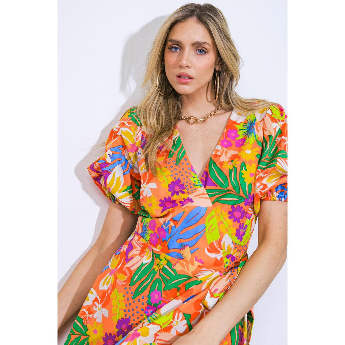 a woman in a floral dress