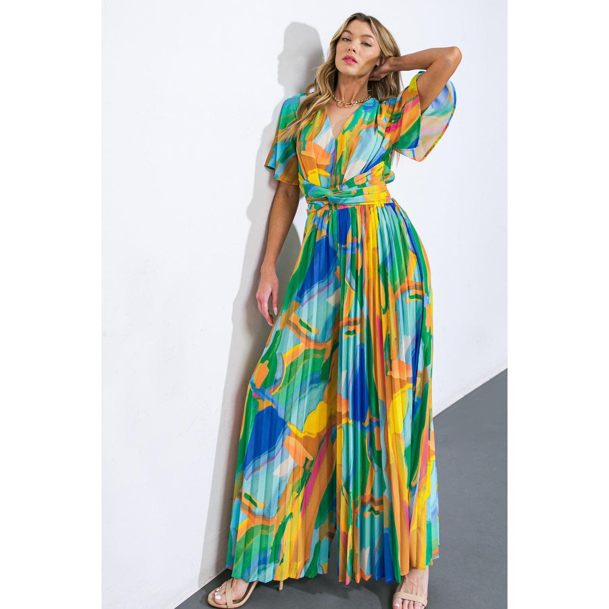 a woman in a colorful dress